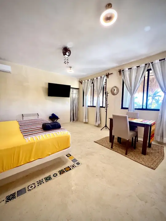 Coco Beach Room with king bed, desk and Smart TV
