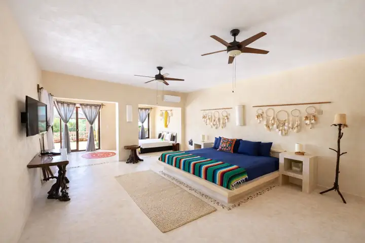 Luma Garden room with king bed, dreamcatchers and ceiling fan